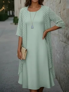 Streifen- und geometrisches Kleid